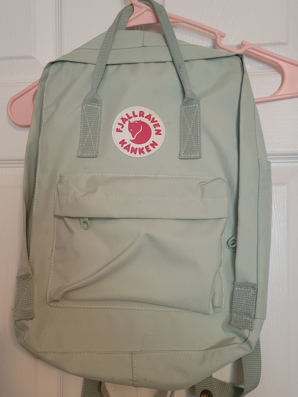Fjallraven Kånken Backpack in Pale Green with Pink Logo